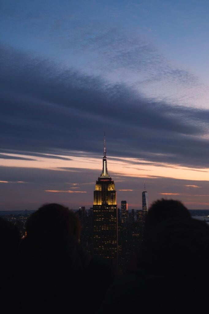 Photo of a couple at the Top of the Rock in NYC