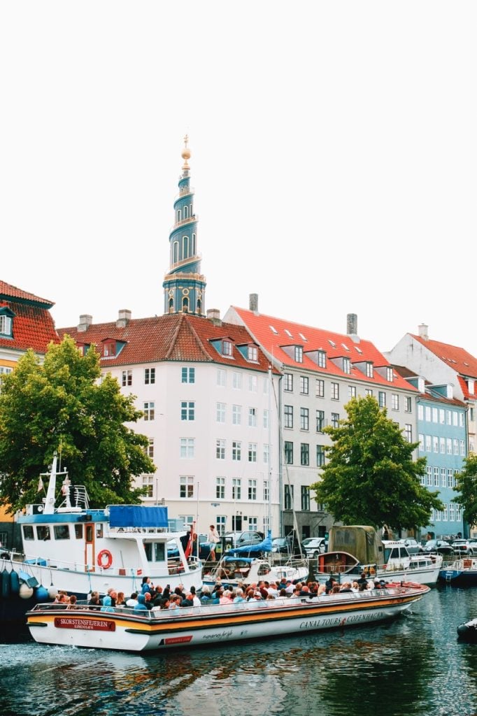 boat tour in christianshavn, copenhagen, during the summer
