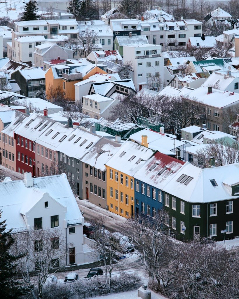 A photo of colorful houses in Reykjavik seen from Hallgrímskirkja