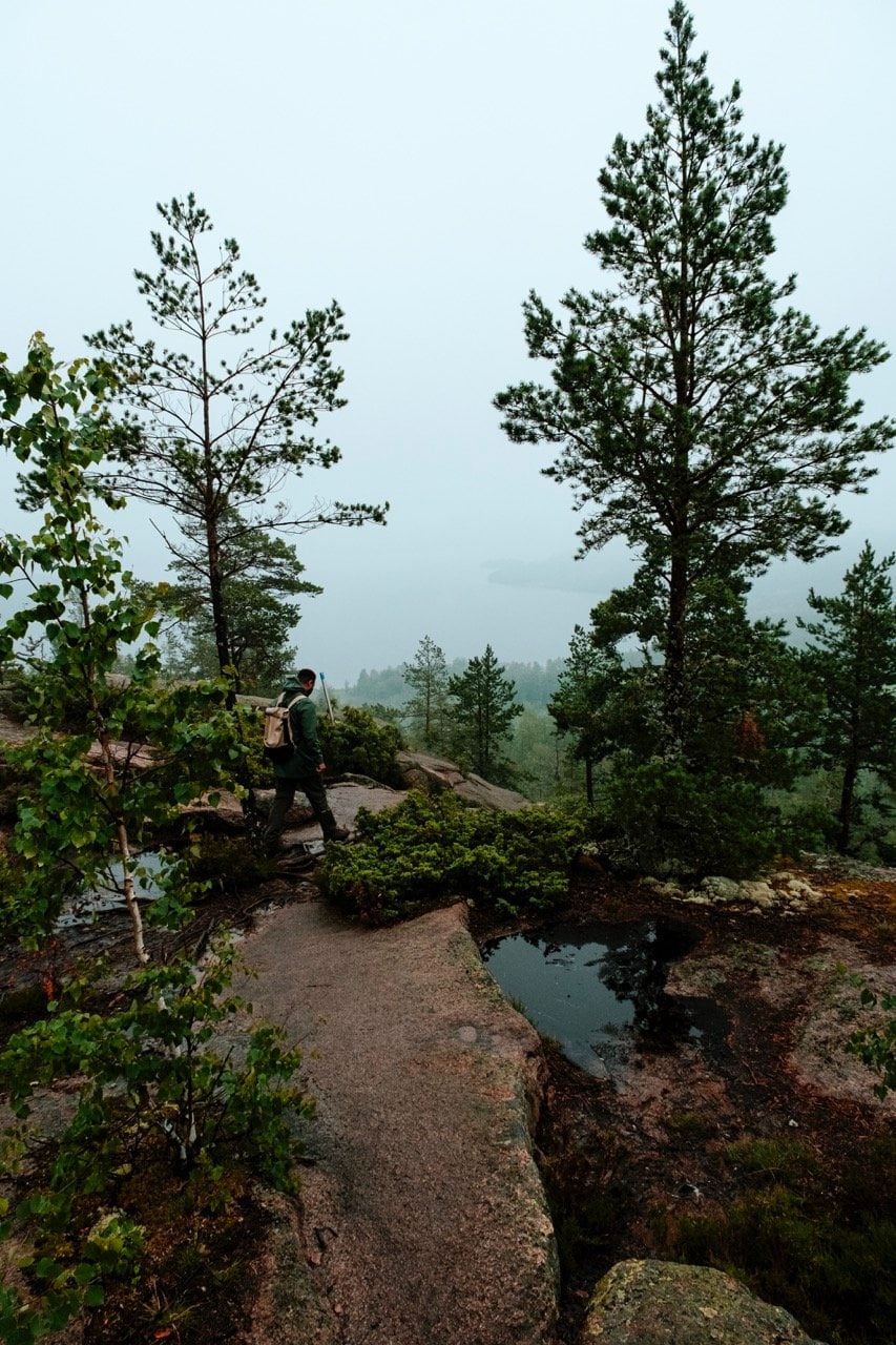 A man hiking on a mountain in Sweden