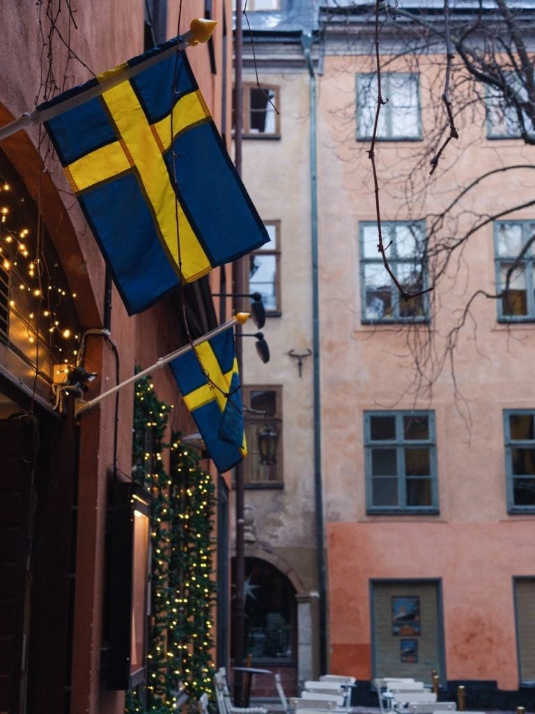 Swedish flags in Stockholm, Sweden, during the winter