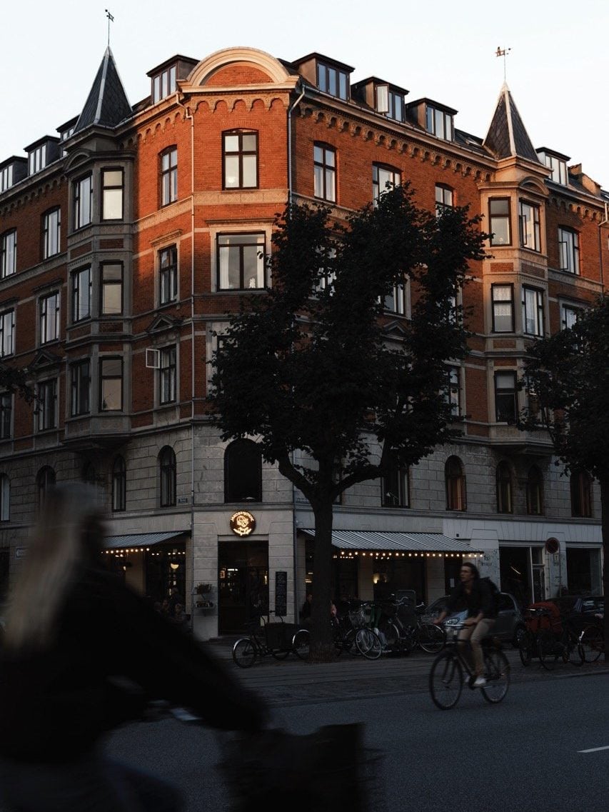 Cyclists along Frederiksberg Allé on a late summer evening