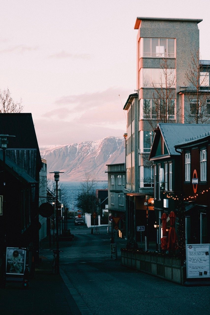 A photo of a mountain and sea in Reykjavik