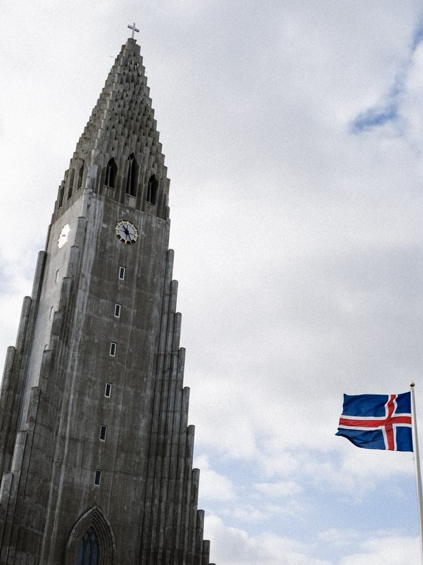 An Icelandic flag outside of Hallgrímskirkja in Reykjavík
