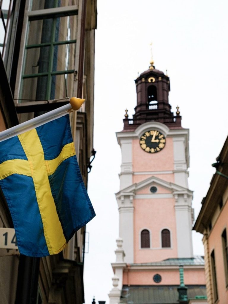 A church in Stockholm with a Swedish flag