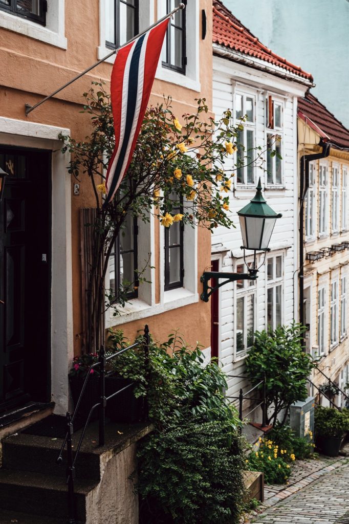 A flag and some houses in Bergen, Norway