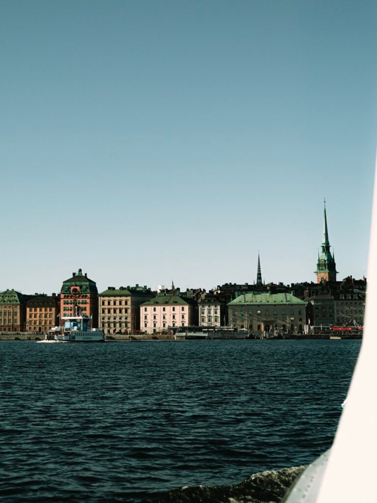 A daytime view of Stockholm's Old Town from a boat