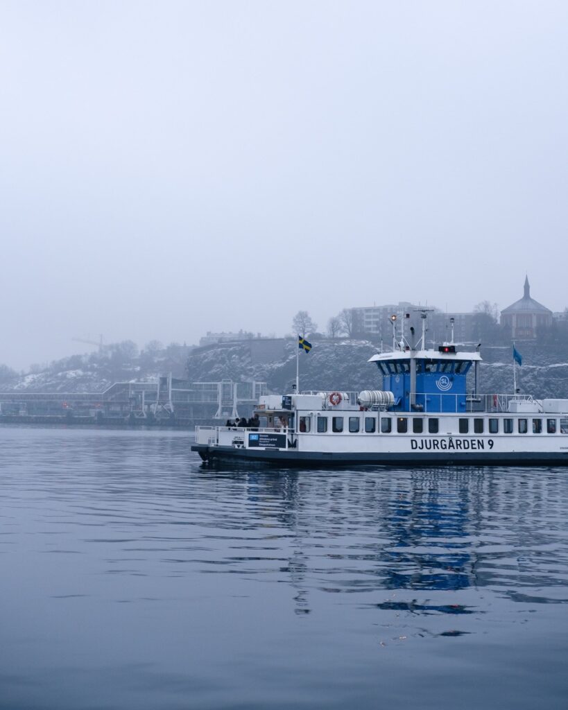 A ferry on a foggy day in Stockholm, Sweden, during the winter