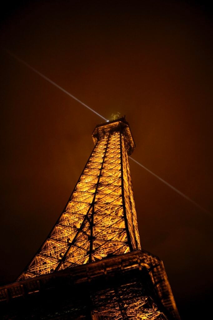 Eiffel Tower with light shining from top