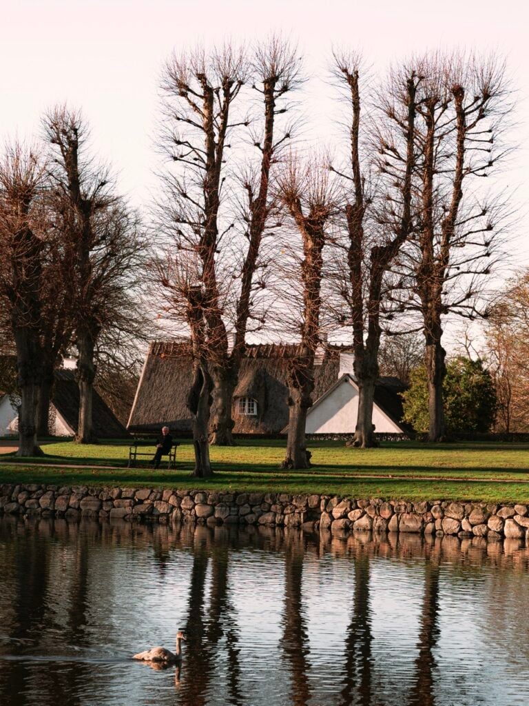 A person sitting outside at Frederiksborg Slot, Hillerød