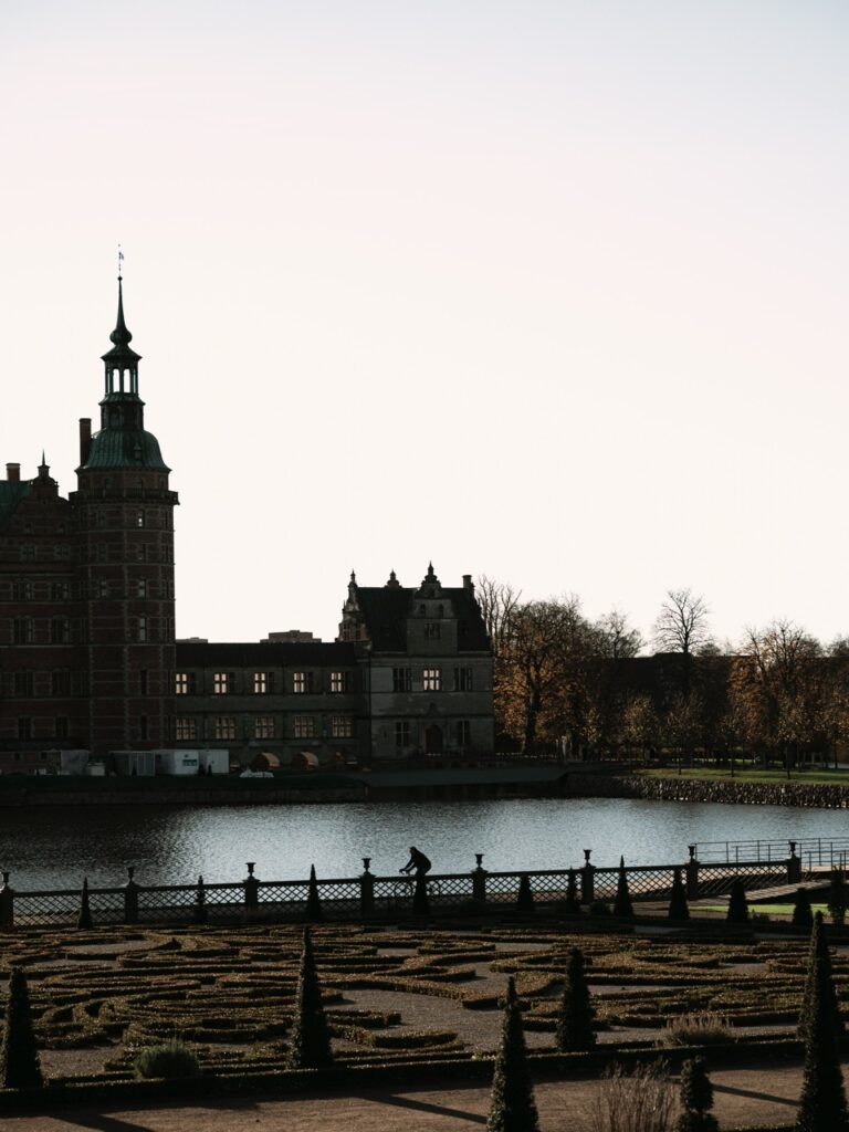 A cyclist in the grounds at Frederiksborg Castle