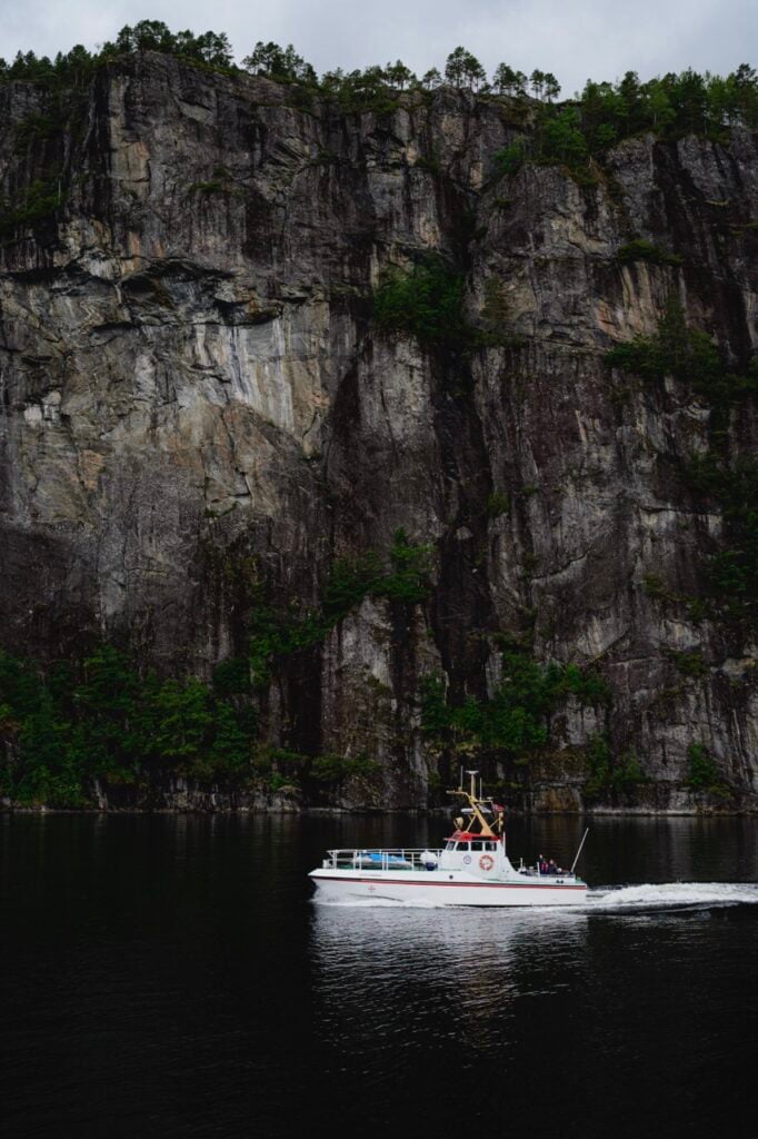 A boat sailing along the Osterfjord in Norway