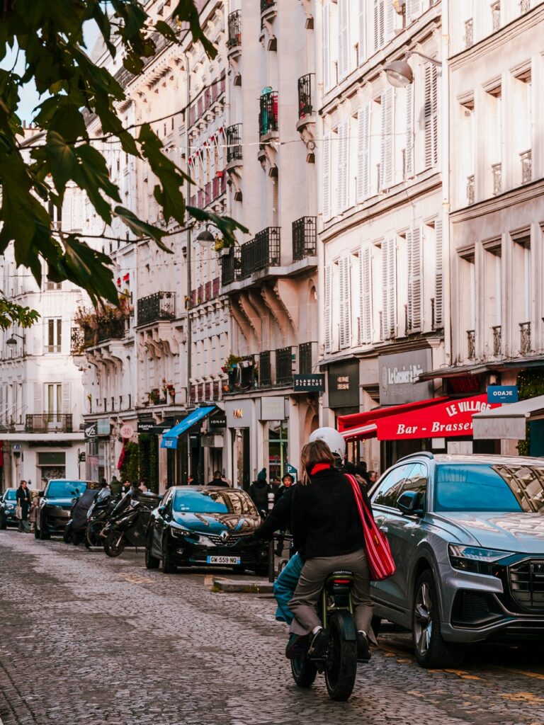 People on a bike in Paris, France