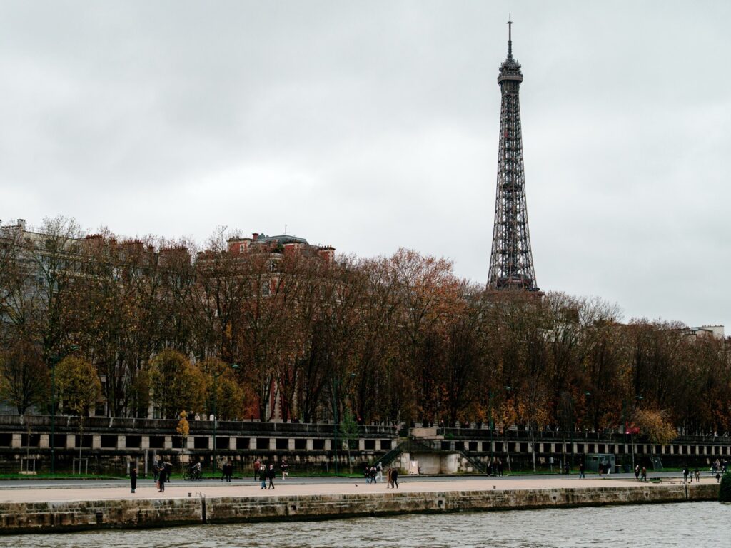 A view of the River Seine's shore and the Eiffel Tower in Paris