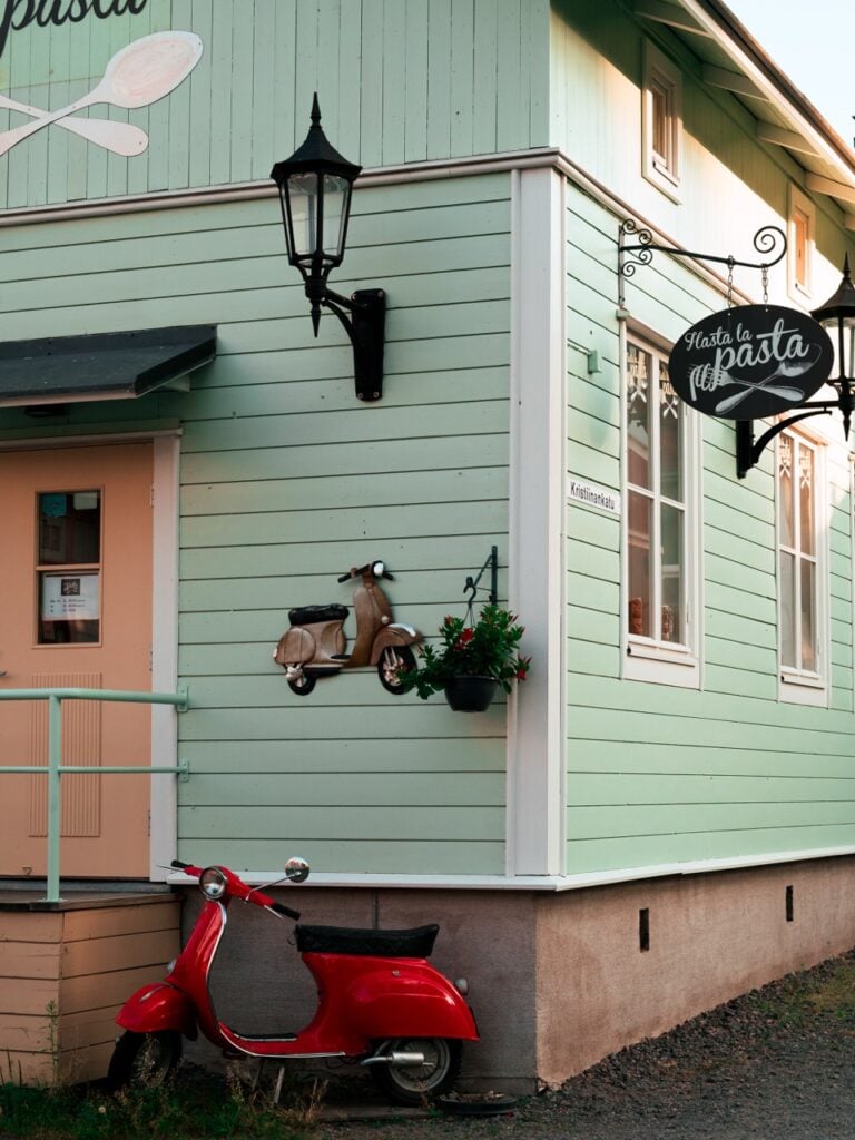 A vespa outside a building in Naantali, Finland