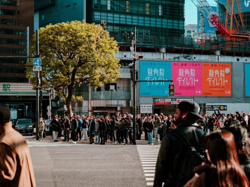 The Shibuya Crossing in Tokyo, Japan, at street level