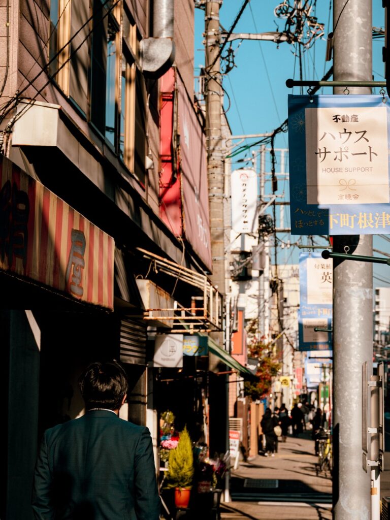 A salaryman walking in Nezu, Tokyo