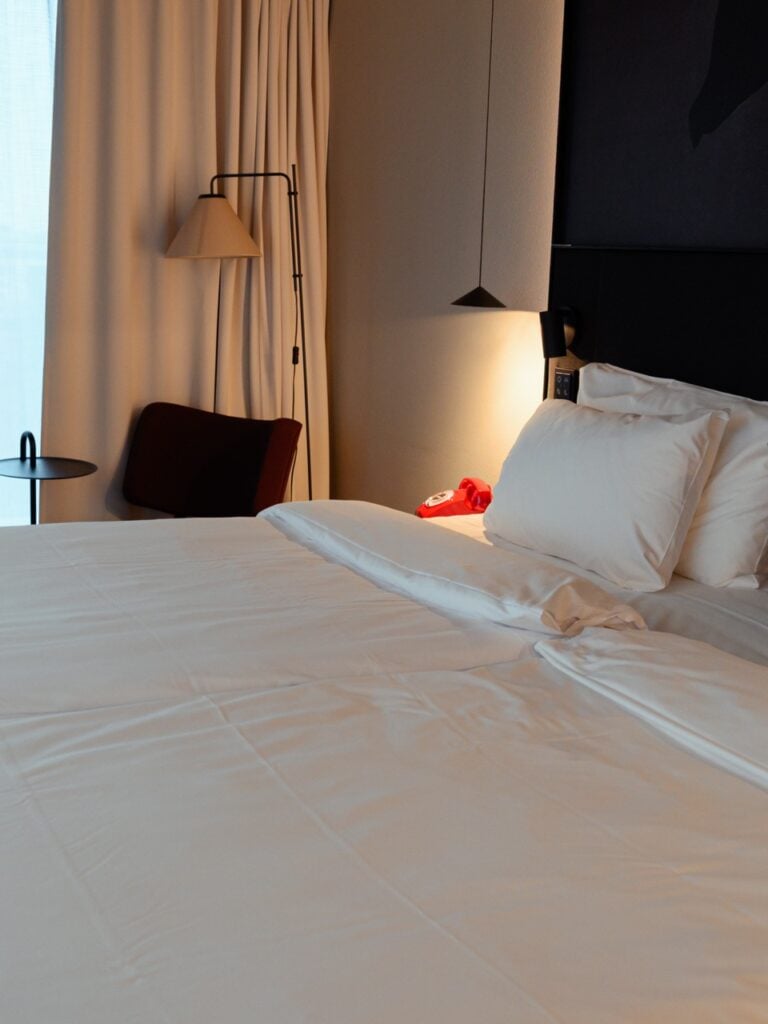 A bed in a room at Radisson RED in Helsinki, Finland
