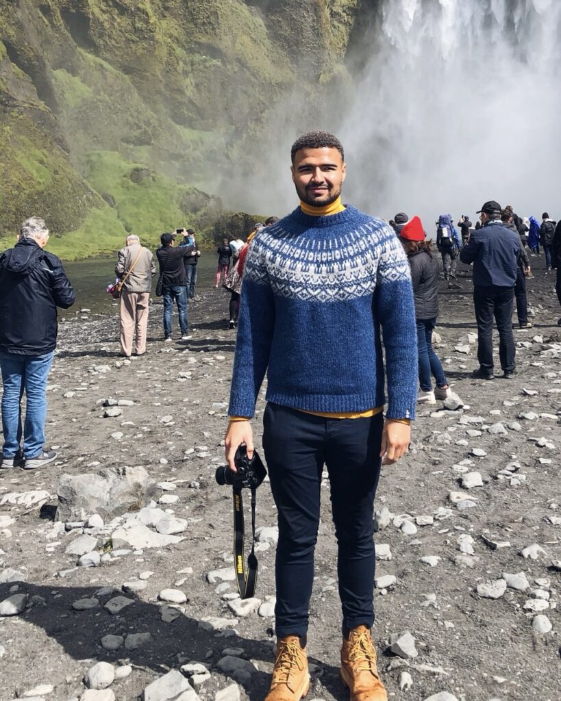 Danny at Skógafoss in Iceland on a day tour