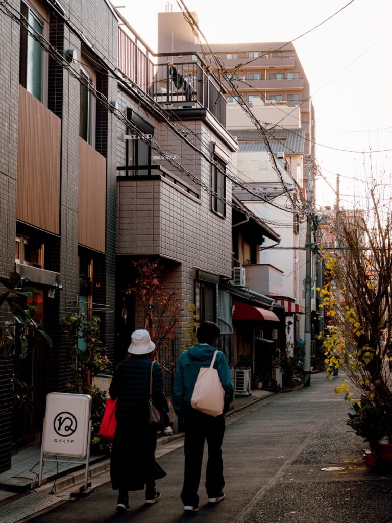 A couple walking in Tokyo, Japan