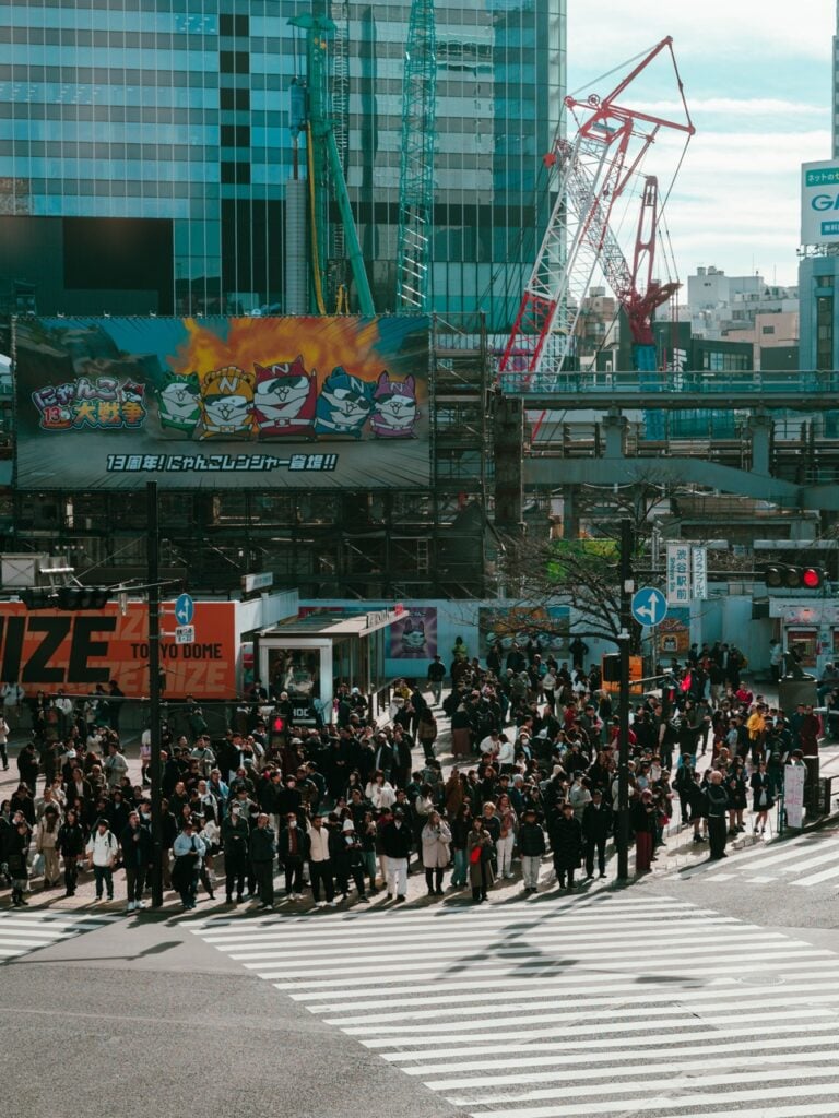 People waiting to cross at the Shibuya Crossing in Tokyo
