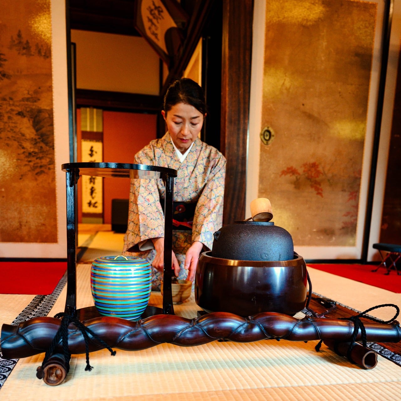 A person leading a tea ceremony in Kyoto, Japan