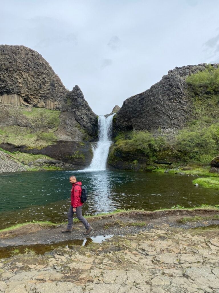 A man in Gjáin, Iceland