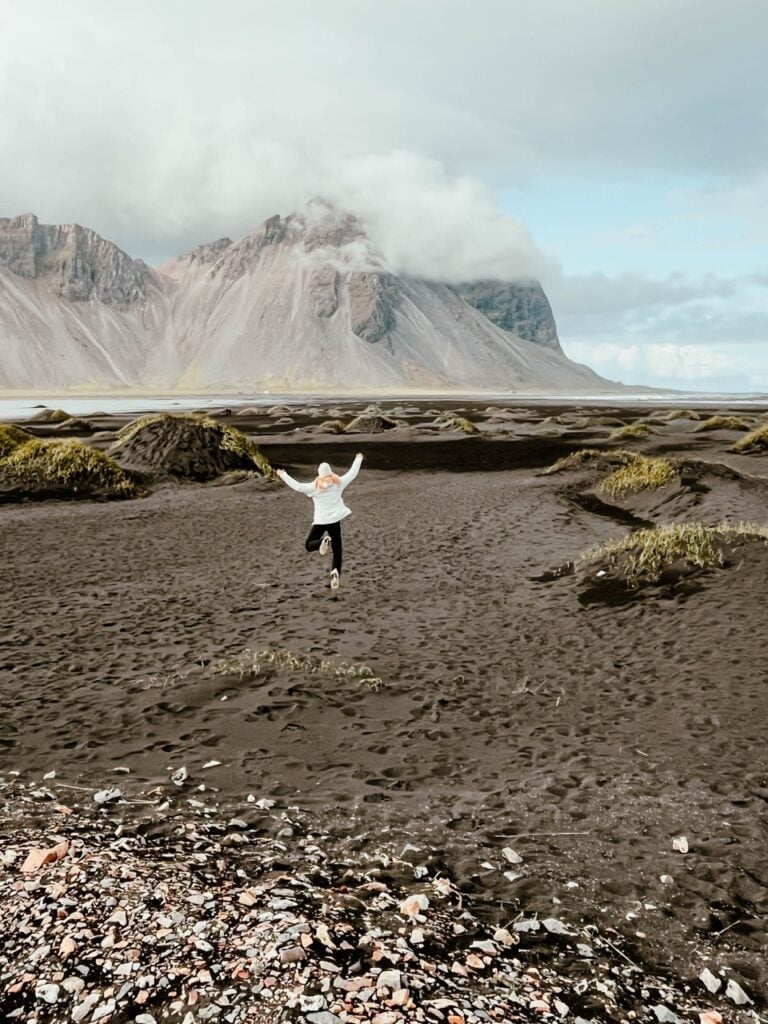 A person at the Vestrahorn mountain in Iceland
