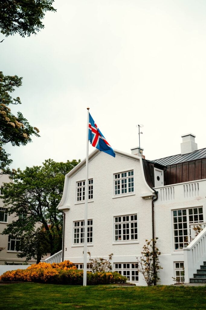 A house and Icelandic flag in Reykjavík
