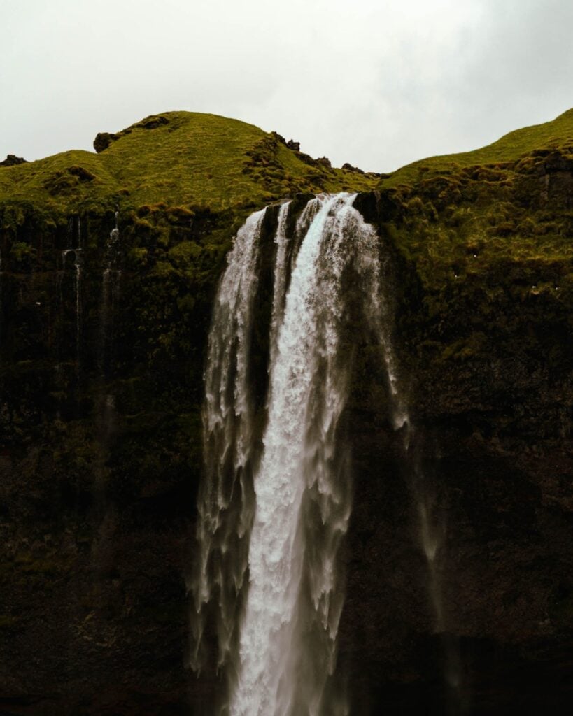 The Seljalandsfoss waterfall in Iceland on a cloudy day