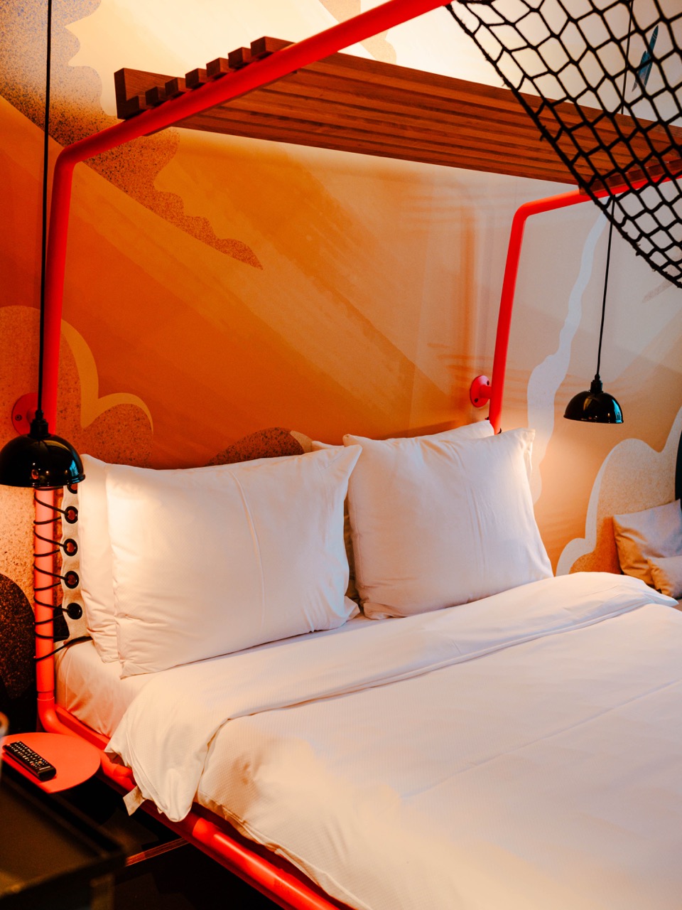 A bed in a room at Superbude Wien Prater in Vienna