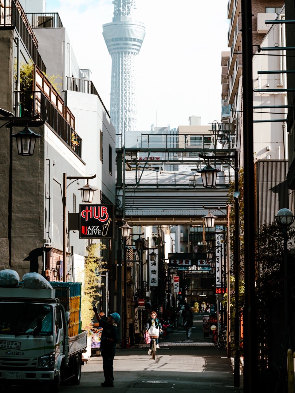 A person cycling in Asakusa, Tokyo