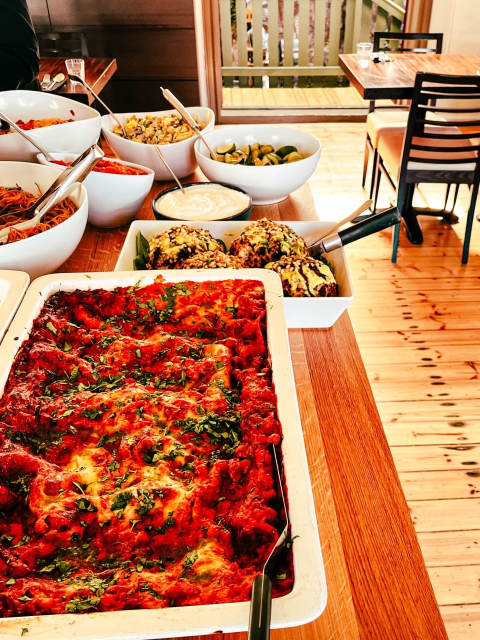 Eating lasagna at the settlement center in borgarnes, iceland