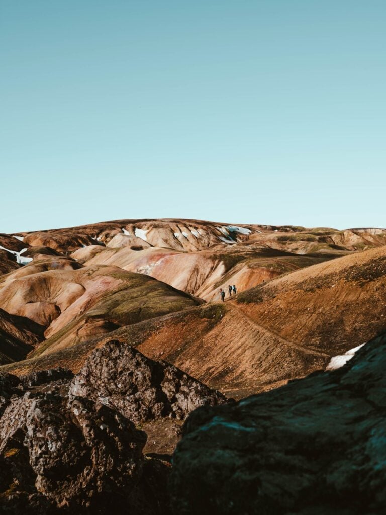 Hiking a mountain on the Laugavegur Trail in Iceland