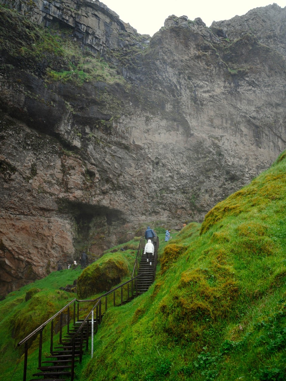 Walking up stairs at Seljalandsfoss